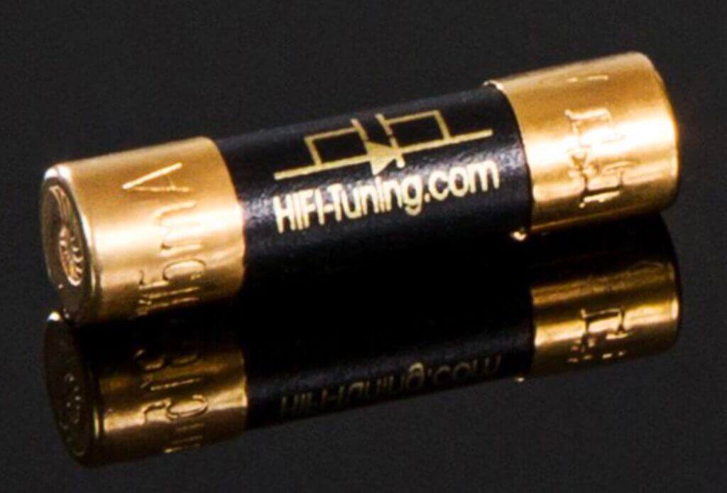 HiFi‑Tuning Supreme³ fuse with copper alloy end caps plated in gold and black ceramic body, handmade in Germany for audiophile systems. 